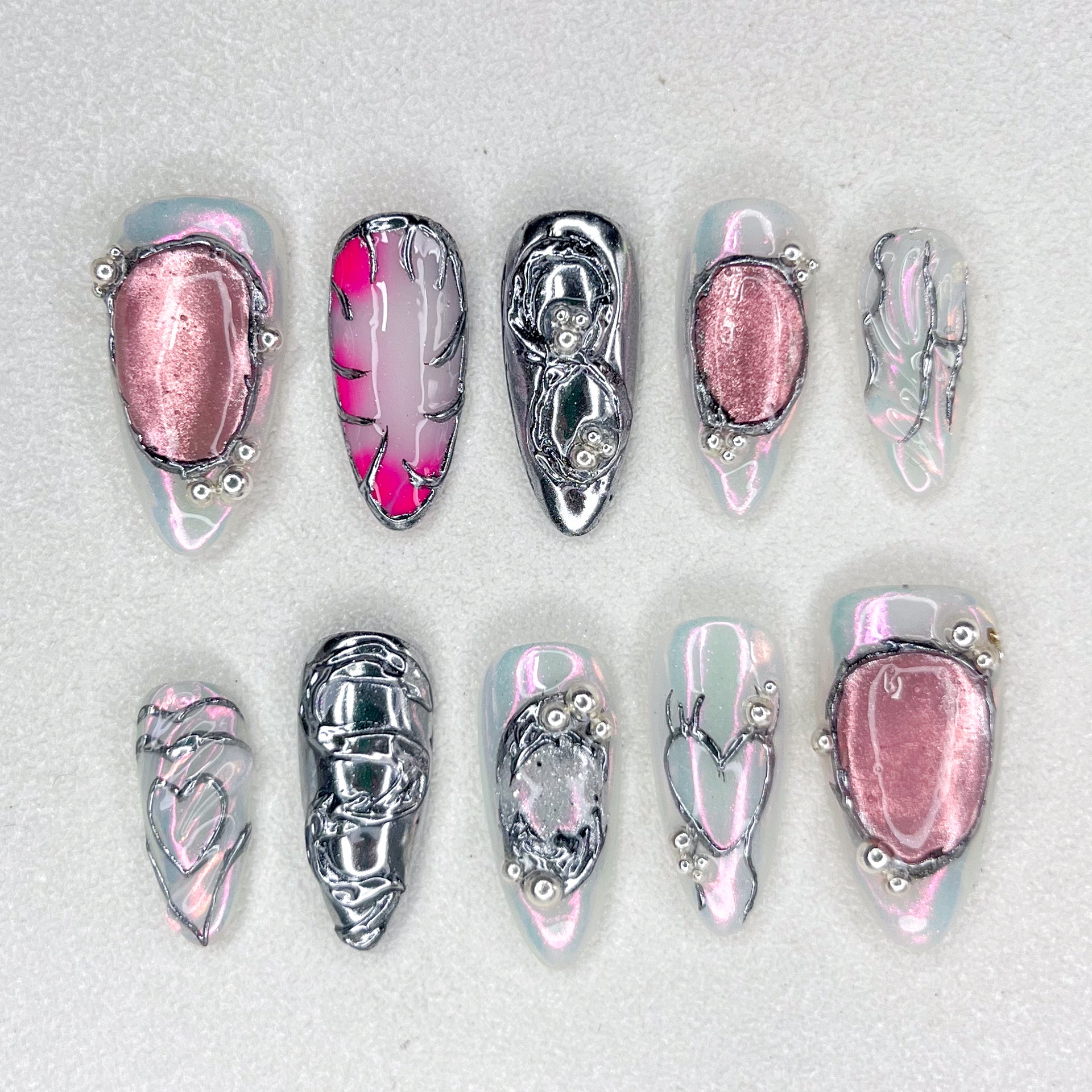 Chrome Melted Heart Nails